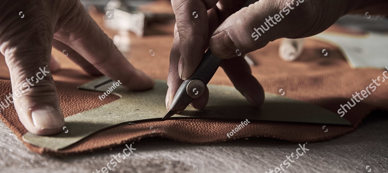 stock-photo-shoe-production-process-in-factory-570916663_cropped.jpg